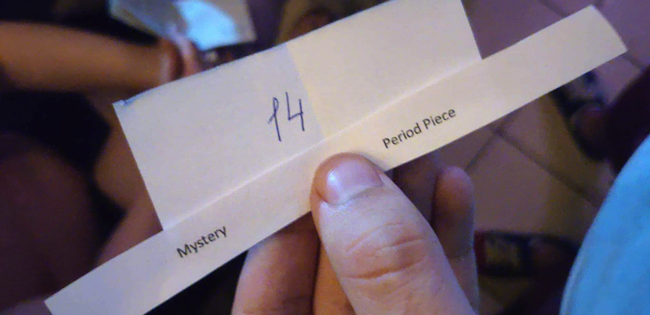 Lísteček se zadáním. Máte na výběr vždy ze dvou možností. Bohužel druhým žánrem je dobový film a to je sebevražda, když nemáte k dispozici dobové kostýmy ani dekorace. Lístek se zadáním 48 Hour Film Project