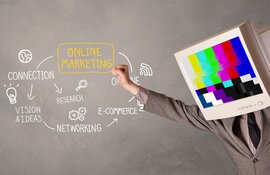 Muž v obleku s televizí místo hlavy